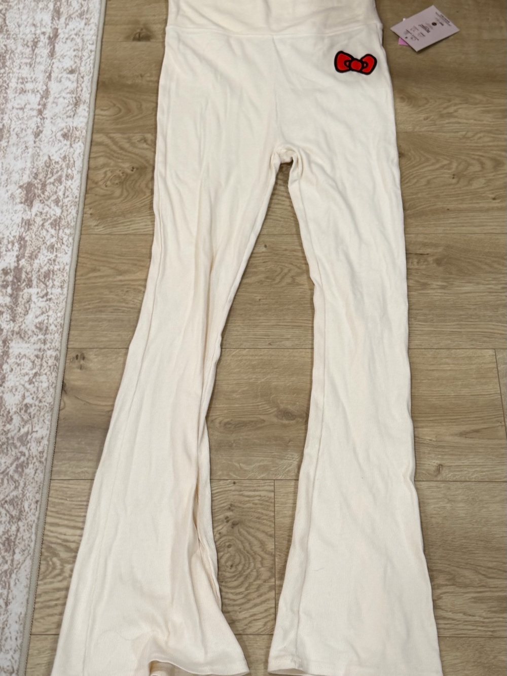 Hello Kitty Cream Flare Lounge Pants with Red Bow Patch